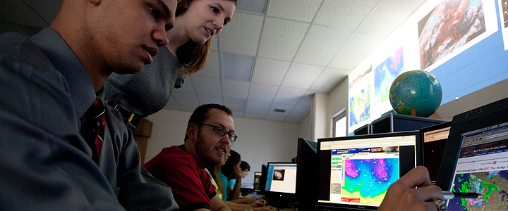 faculty and students in meteorology lab