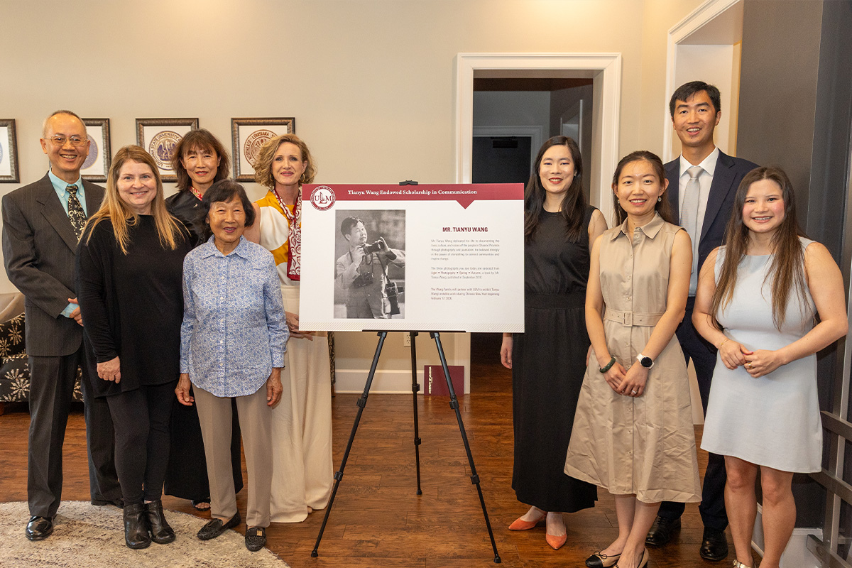 The family of Mr. Tianyu Wang pose with President Castille at reception honoring the creation of a scholarship in Mr. Wang's name. 